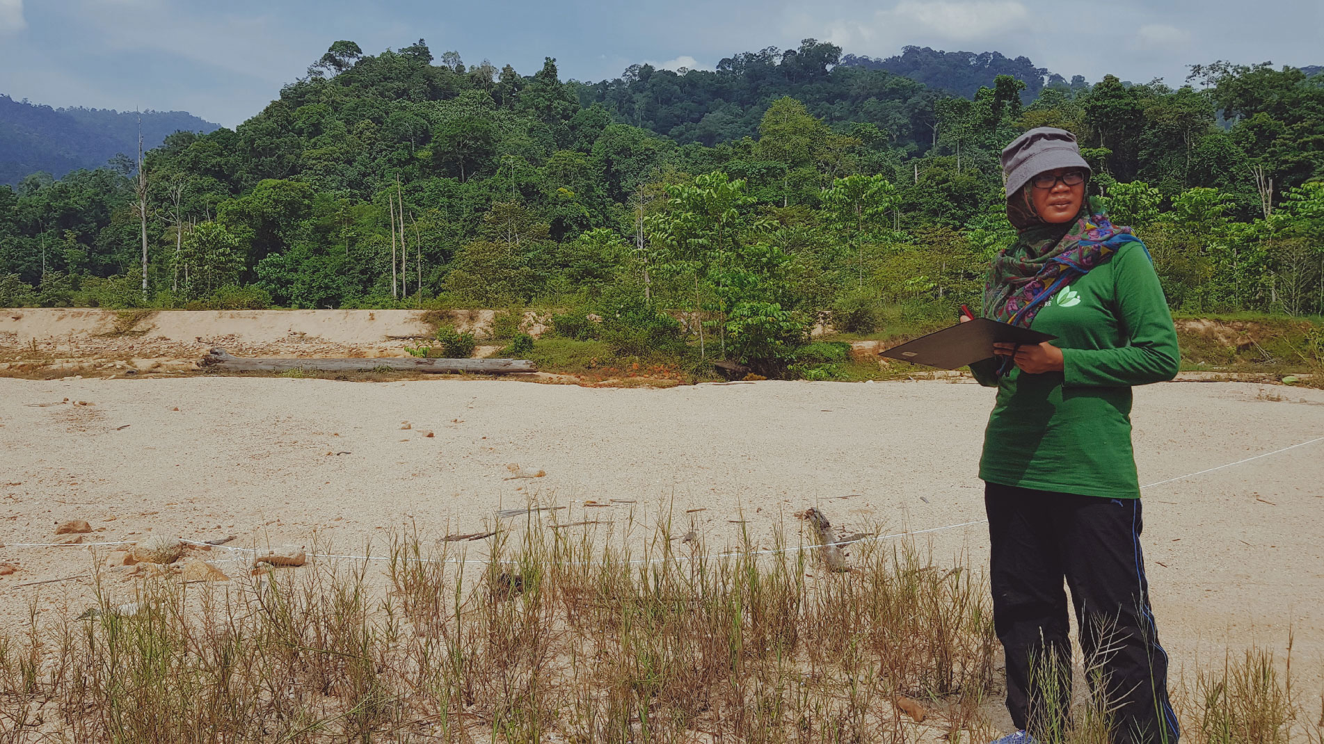 Sungai Lawit, Terengganu. /Central Forest Spine/ Nur conducting a survey to assess the degradedness level of a site in Terengganu.