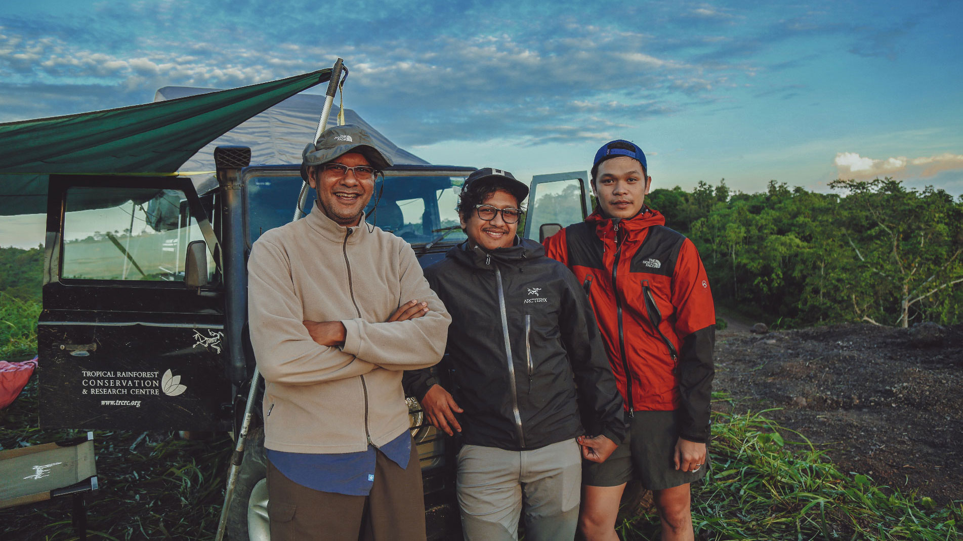 TRCRC team and Dr. Reza Azmi from Wild Asia enjoying a scenic view from the campsite they have set up in TRLC Merisuli.
